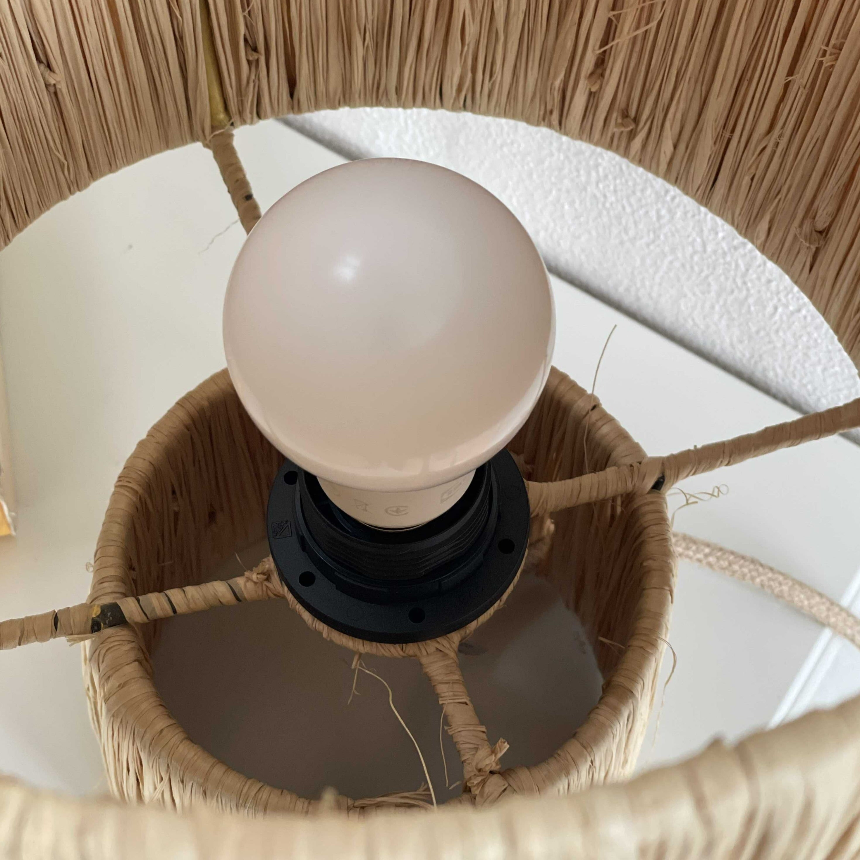 Table lamp in raffia