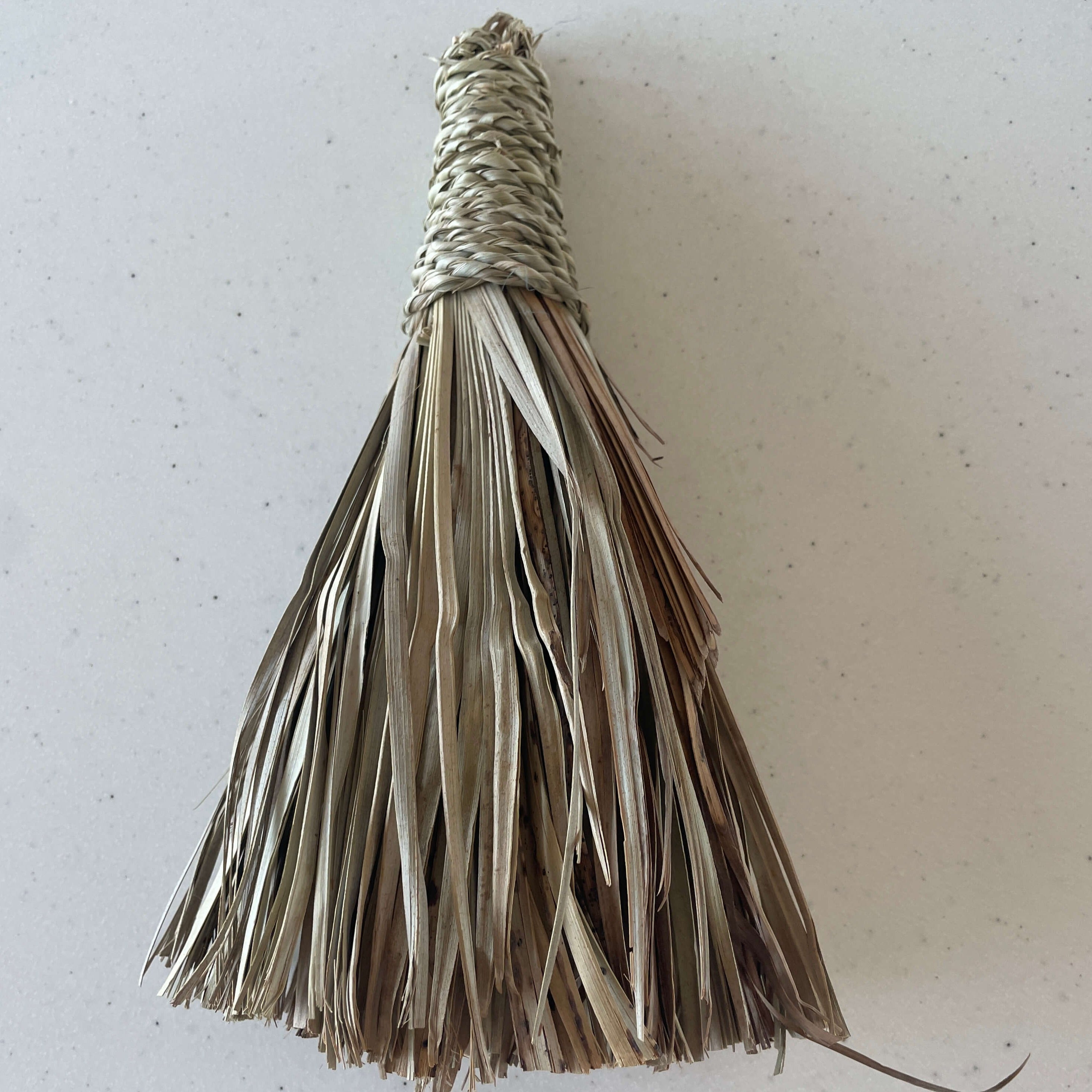 Broom made of palm leaves - 25 cm.