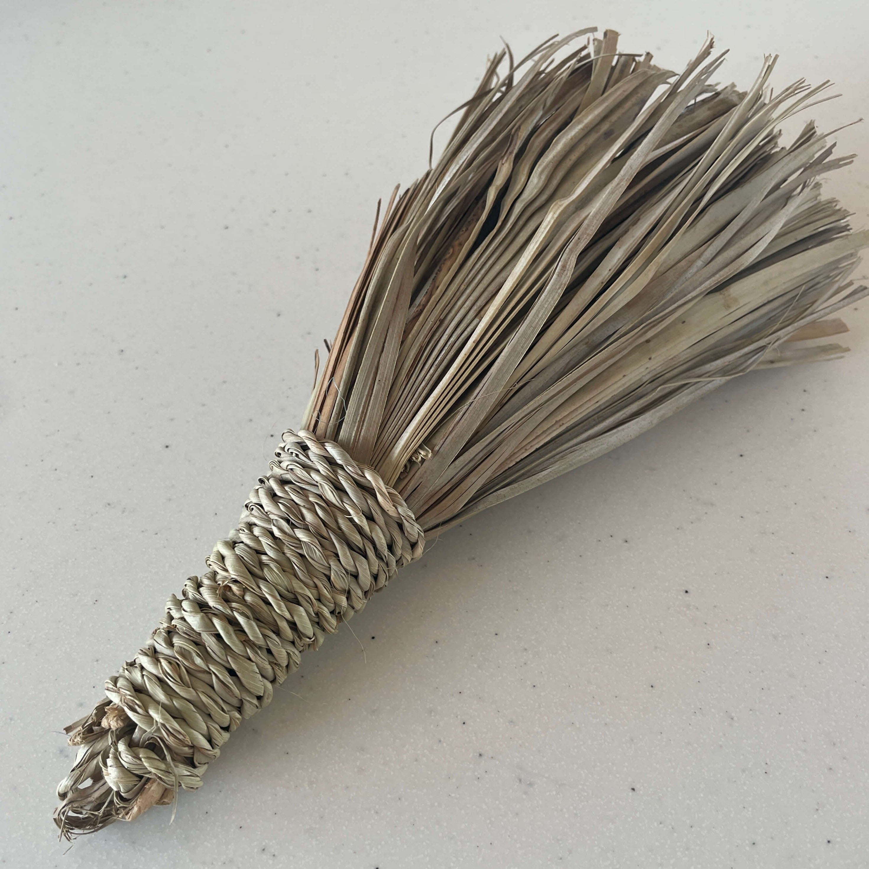 Broom made of palm leaves - 25 cm.