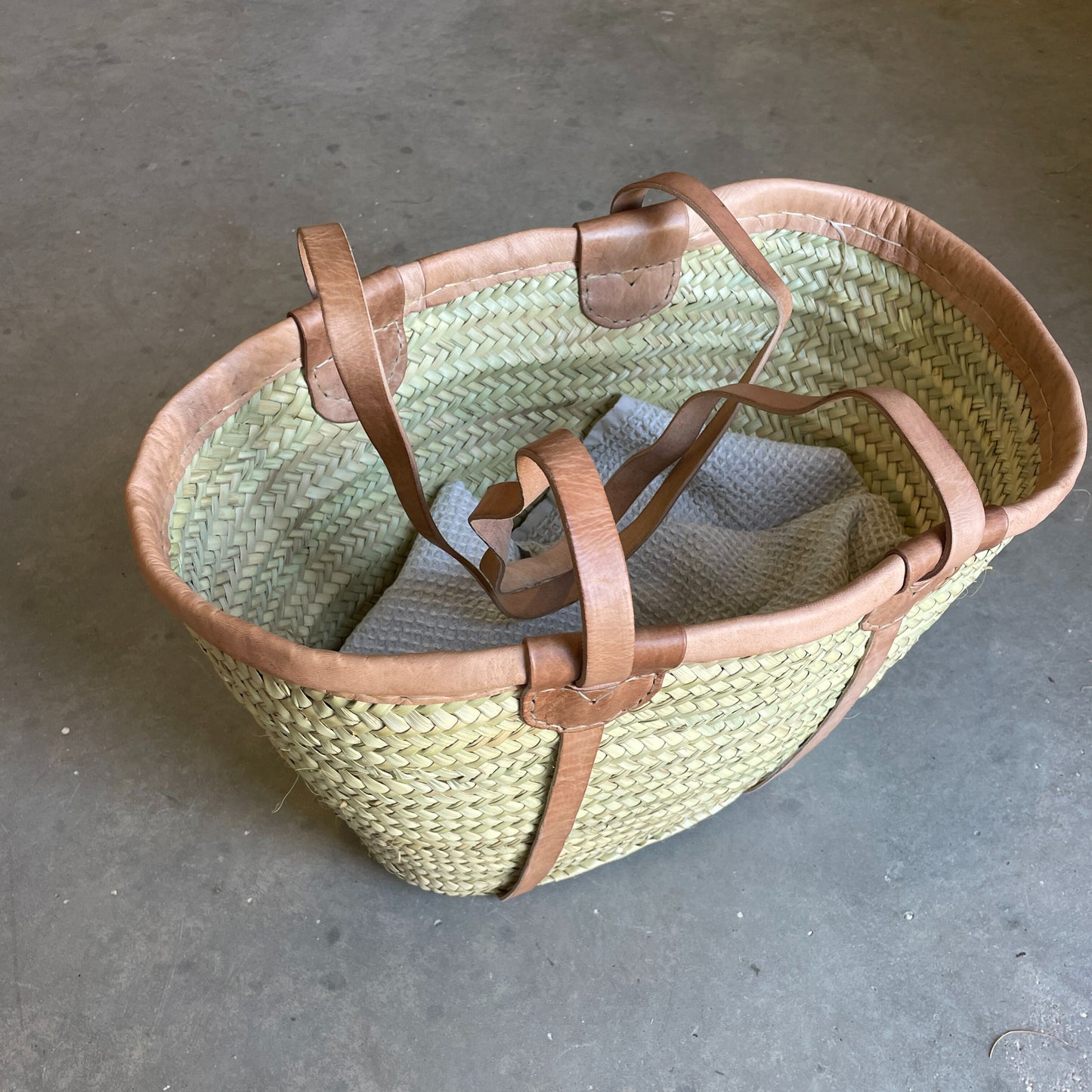 Basket with leather straps - 50 cm. at the top.