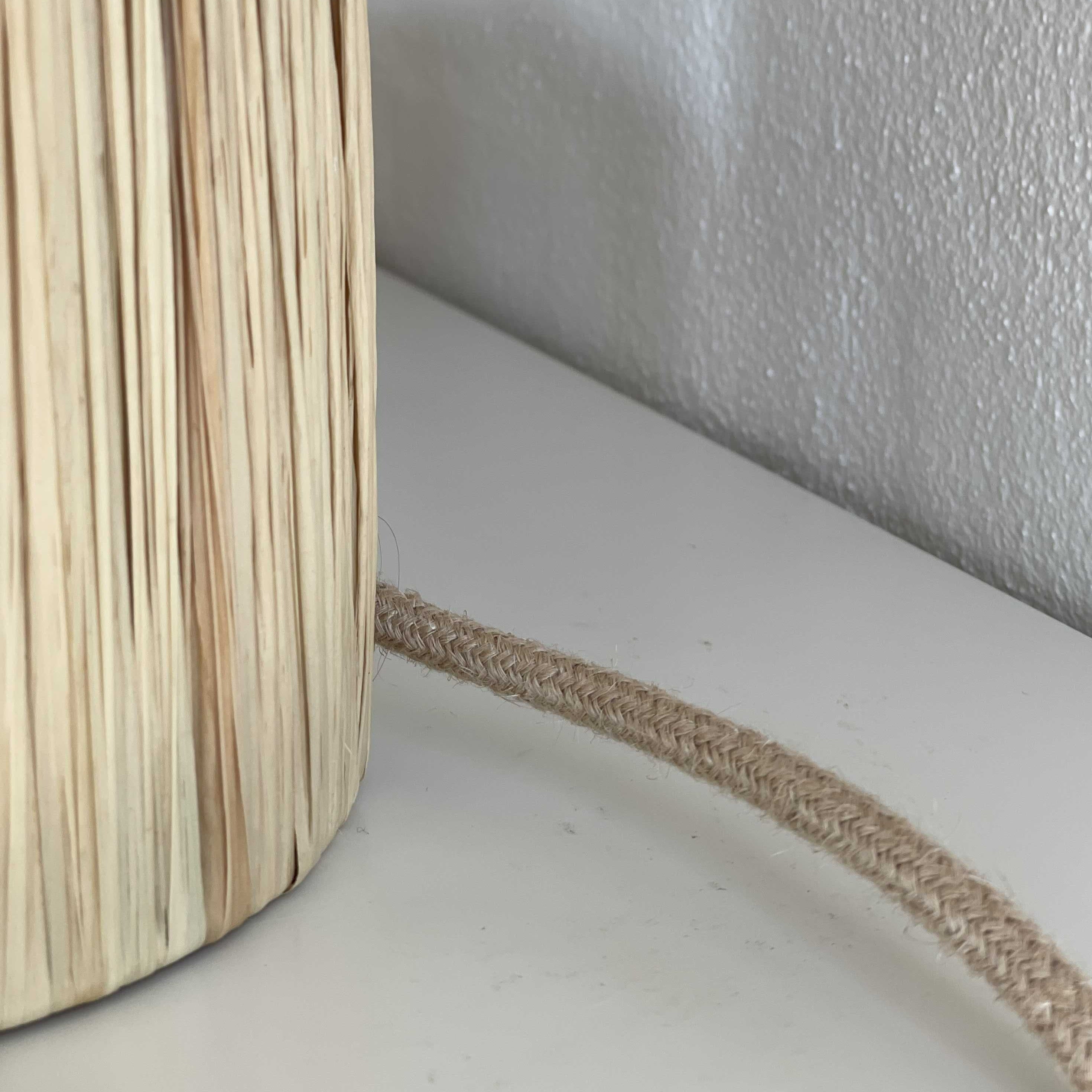 Table lamp in raffia